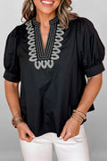 Blusa negra con cuello en V