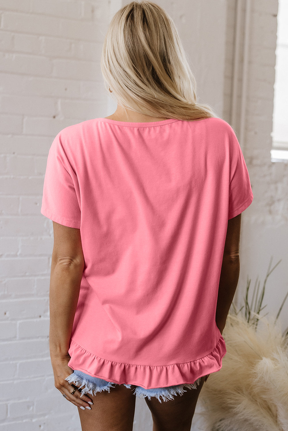 Camiseta suelta de dobladillo