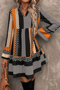Minivestido con cuello en V y dobladillo