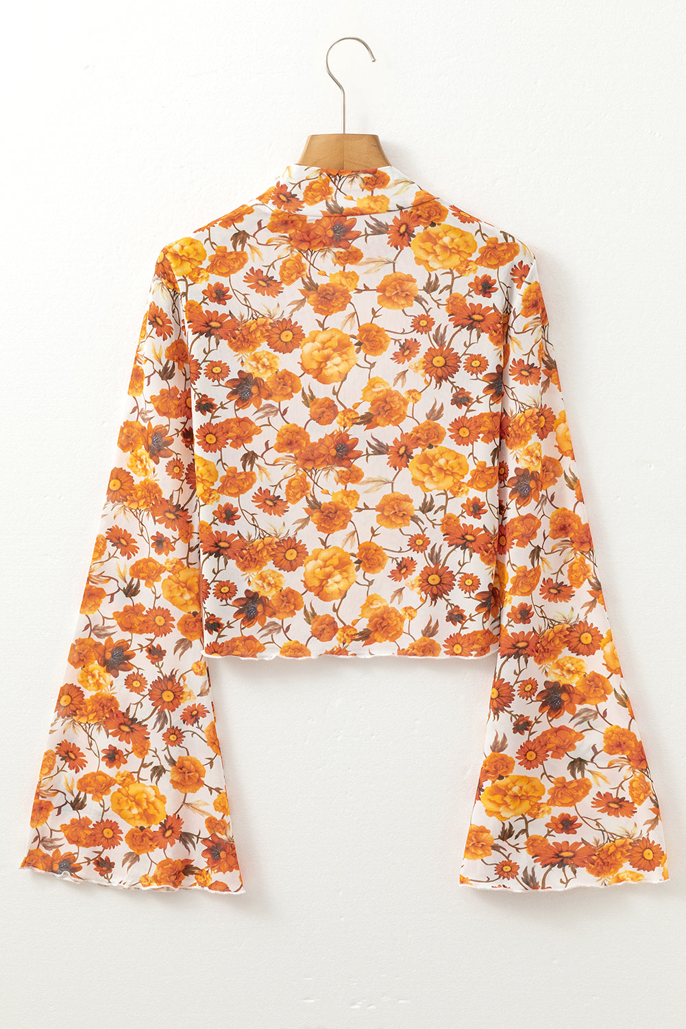 Blusa con estampado floral y manga acampanada