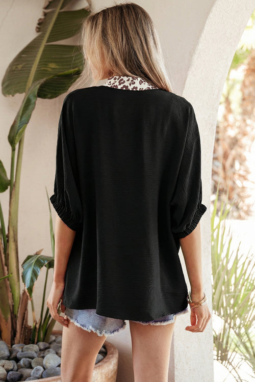 Blusa con cuello en V y ribete de patchwork