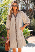 Vestido camisero con manga pulsera suelta