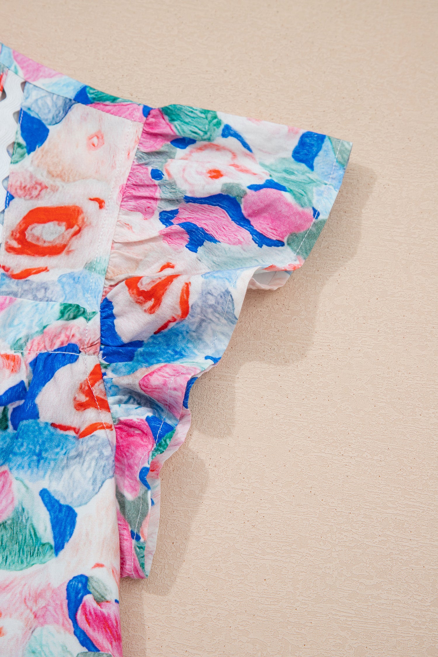 Blusa manga corta con volante