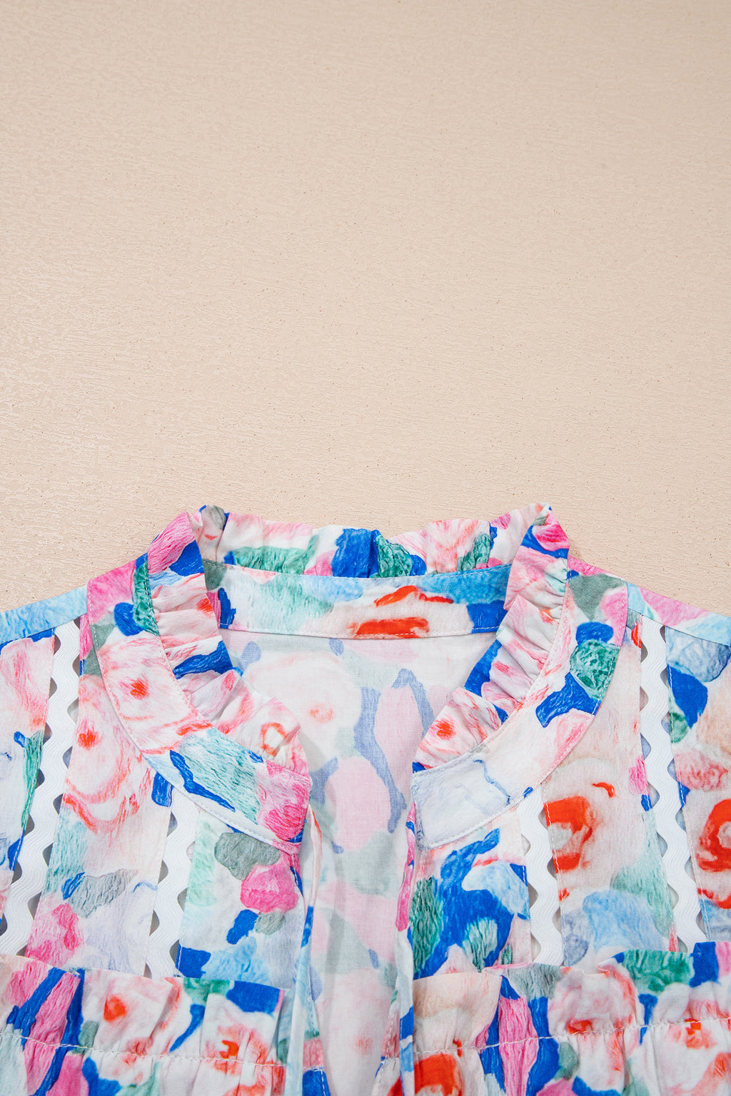 Blusa manga corta con volante