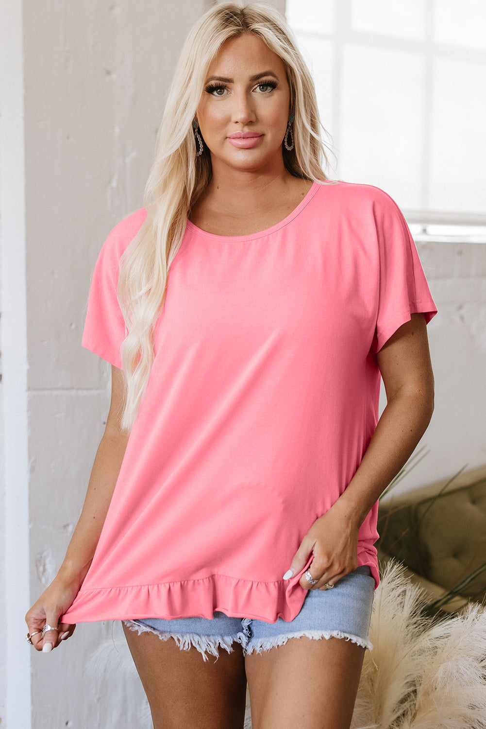 Camiseta suelta de dobladillo