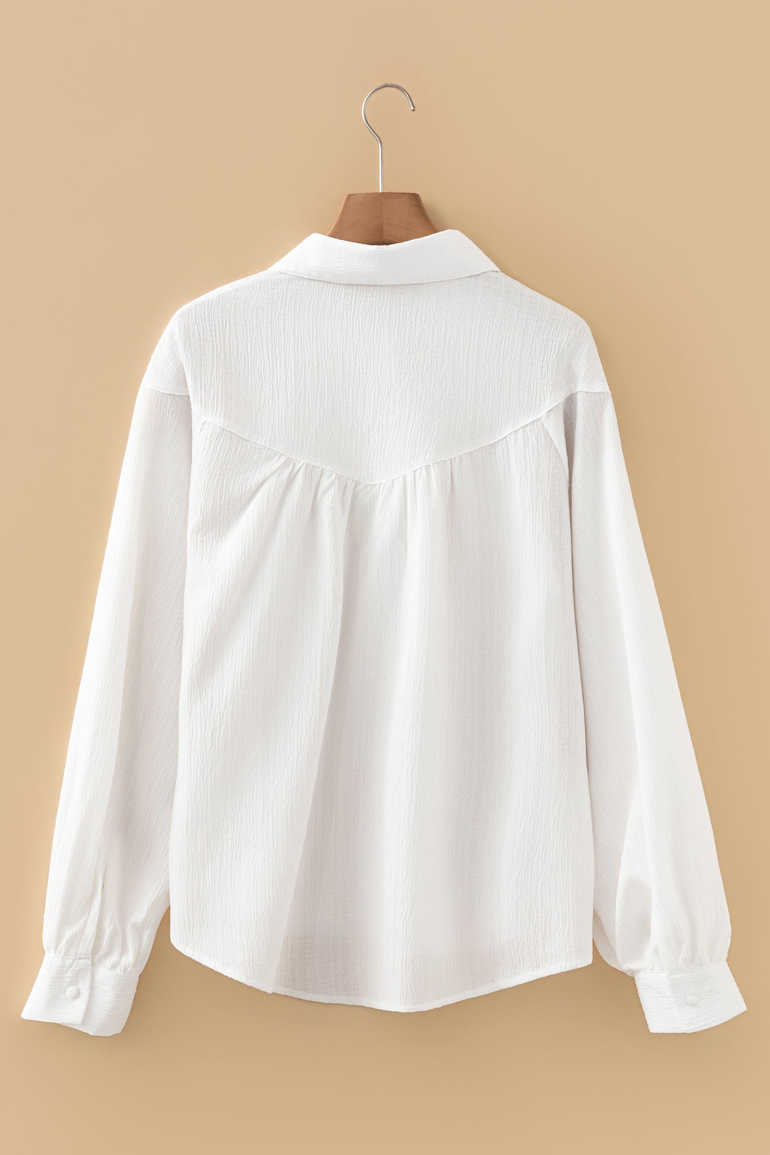 Camisa holgada con botones y manga farol
