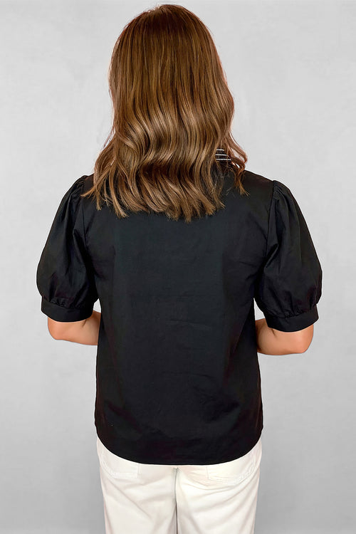 Blusa negra con cuello en V