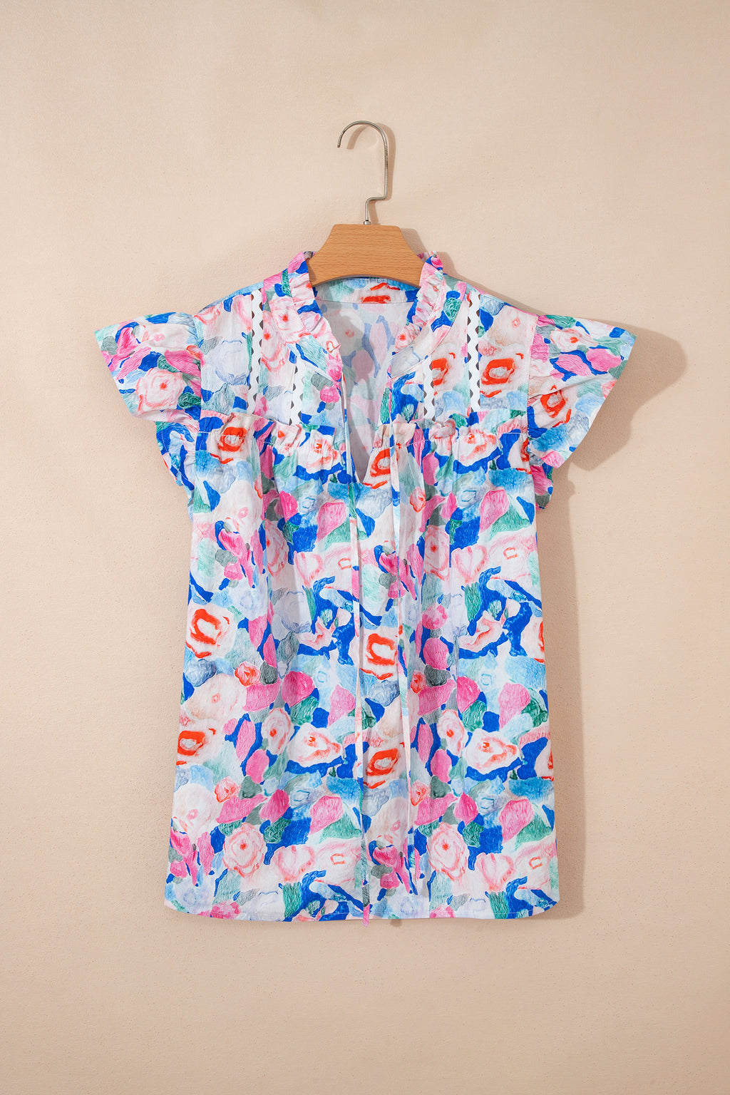 Blusa manga corta con volante
