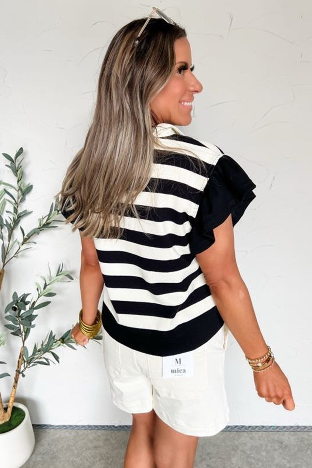 Blusa manga corta con volantes y cuello en V