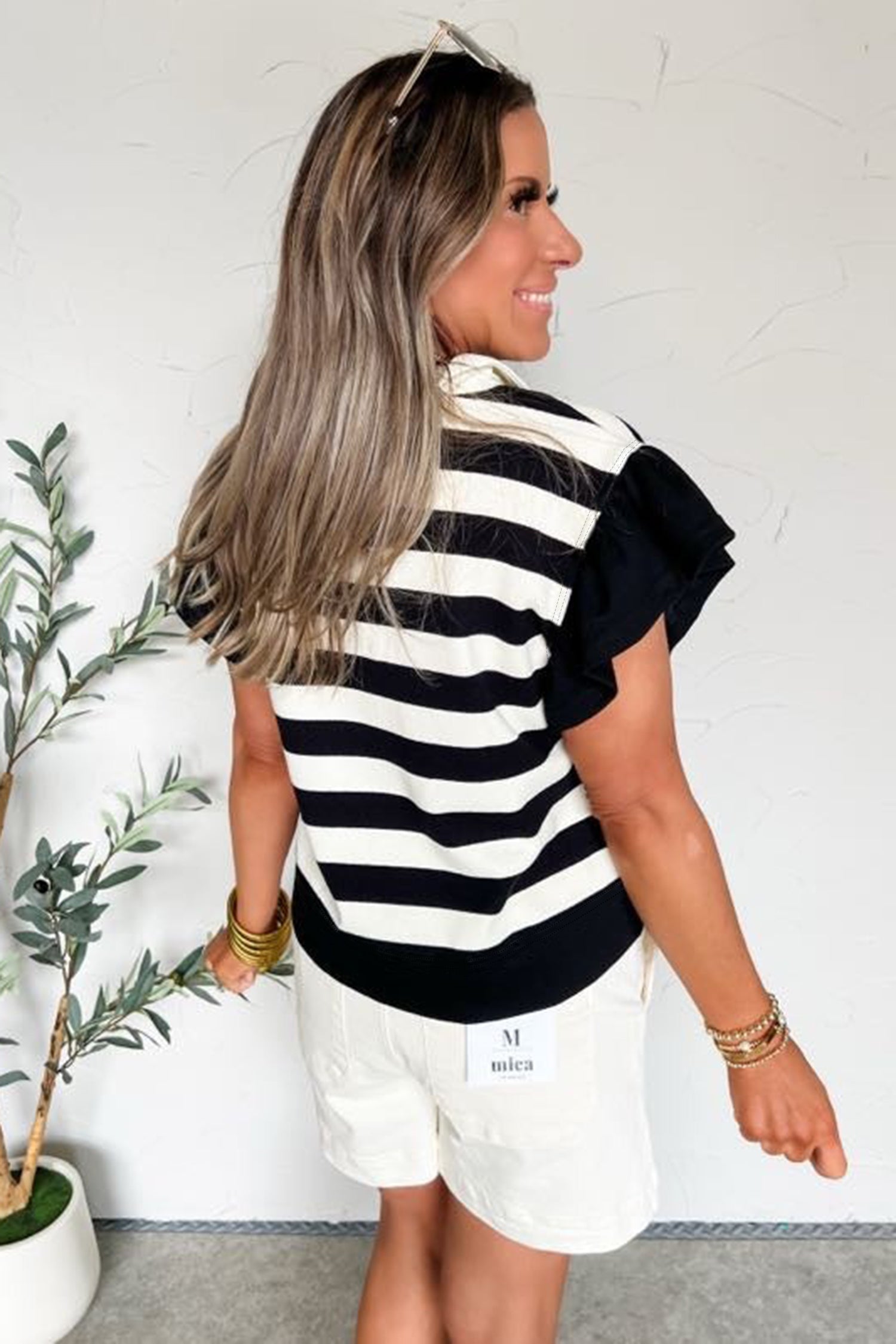 Blusa manga corta con volantes y cuello en V