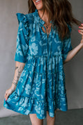 Minivestido con volantes y media manga con flores azules