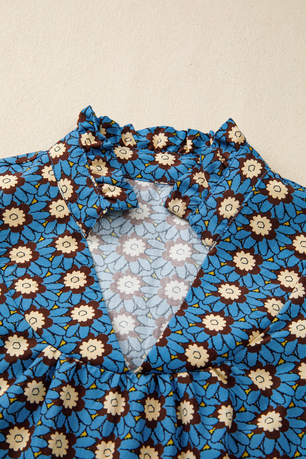 Blusa manga corta abullonada con detalle plisado