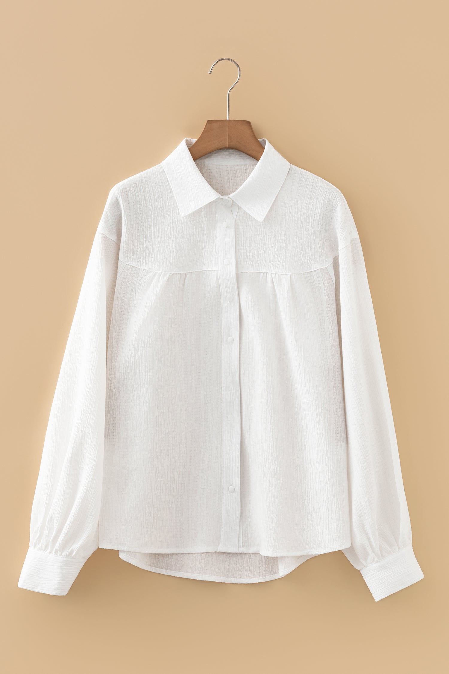 Camisa holgada con botones y manga farol